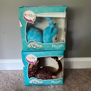 2 squishmellow head phones one is a blue owl and the other is brown deer💙🤎